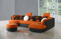 Ъглов диван с табуретка в цвят оранжево и черно